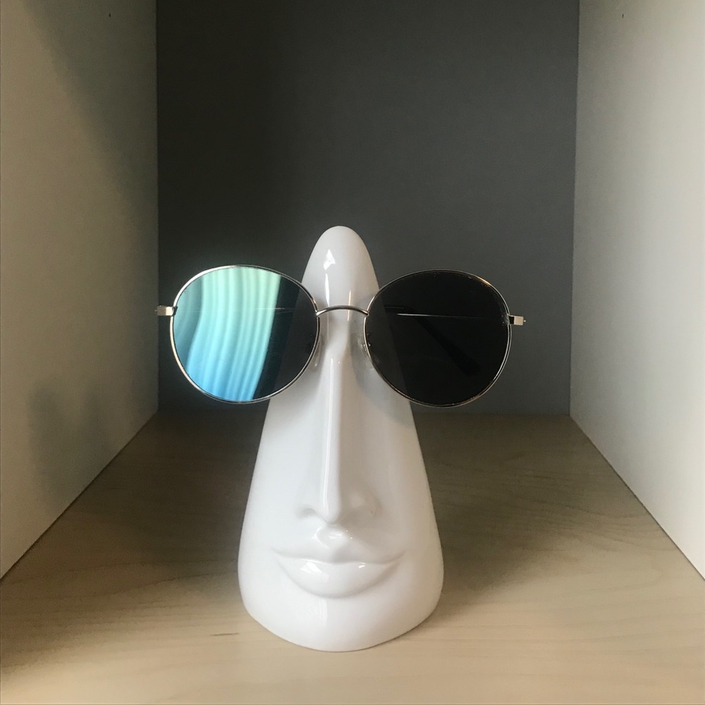 Round metal frame sunglasses with blue tint